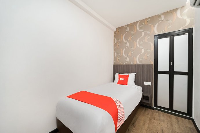 Imagen de la habitación del Hotel OYO 89386 Stay 365 Hotel. Foto 17
