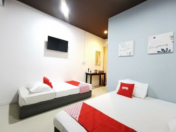 Imagen de la habitación del Hotel OYO 89398 Doorbellz. Foto 17