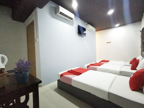 Imagen de la habitación del Hotel OYO 89398 Doorbellz. Foto 26