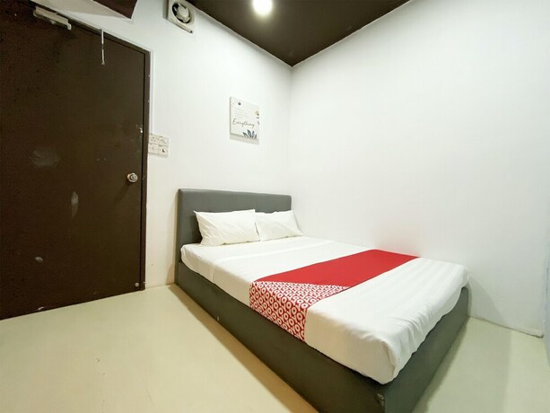 Imagen de la habitación del Hotel OYO 89398 Doorbellz. Foto 28