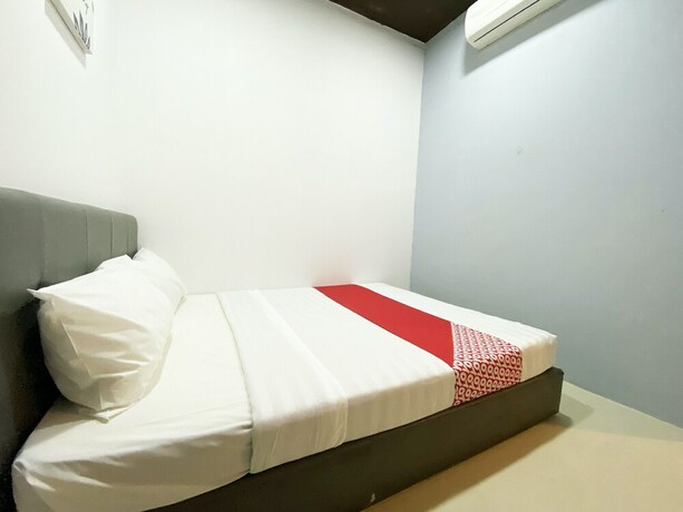 Imagen de la habitación del Hotel OYO 89398 Doorbellz. Foto 30