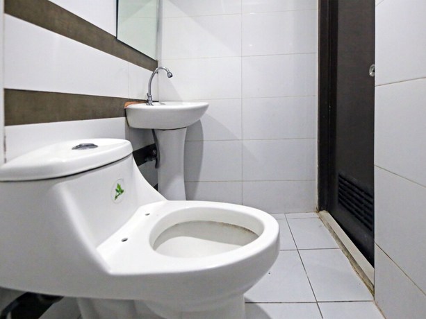 Imagen de la habitación del Hotel OYO 894 Cosmo P Campa Manila. Foto 5
