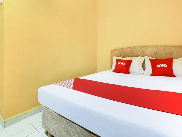 Imagen de la habitación del Hotel OYO 89406 Lucky Budget. Foto 5