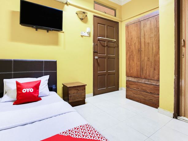 Imagen de la habitación del Hotel OYO 89406 Lucky Budget. Foto 11