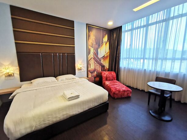 Imagen de la habitación del Hotel OYO 89423 Zenz Hotel. Foto 13