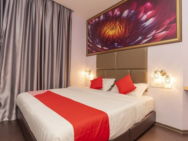 Imagen de la habitación del Hotel OYO 89423 Zenz Hotel. Foto 15