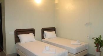 Imagen de la habitación del Hotel OYO 89427 Kavanas Taiping. Foto 3