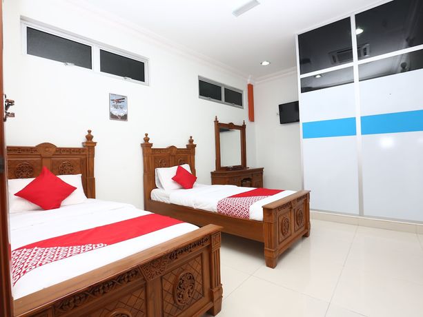 Imagen de la habitación del Hotel OYO 89435 Nusantara Group. Foto 4