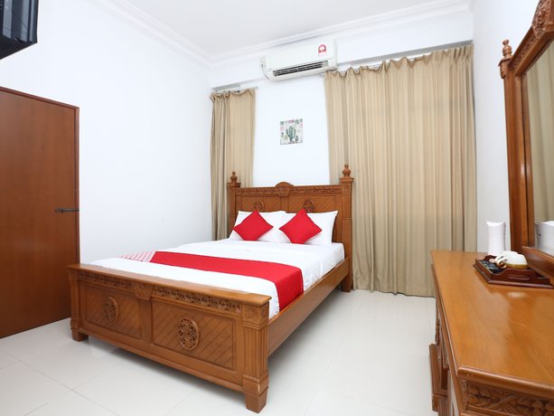 Imagen de la habitación del Hotel OYO 89435 Nusantara Group. Foto 8