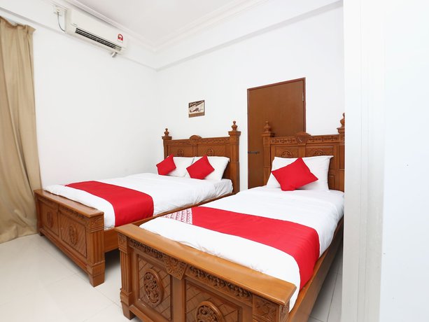 Imagen de la habitación del Hotel OYO 89435 Nusantara Group. Foto 9