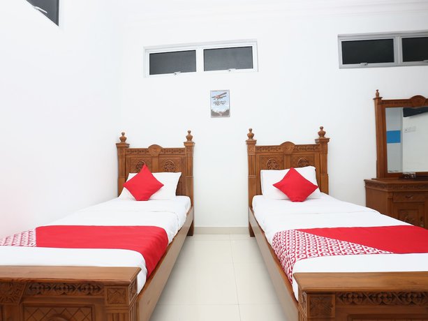 Imagen de la habitación del Hotel OYO 89435 Nusantara Group. Foto 10
