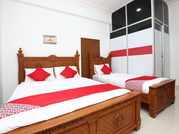 Imagen de la habitación del Hotel OYO 89435 Nusantara Group. Foto 11