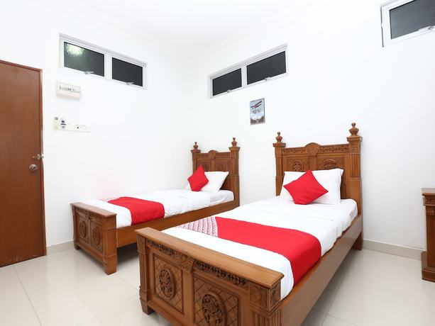 Imagen de la habitación del Hotel OYO 89435 Nusantara Group. Foto 12