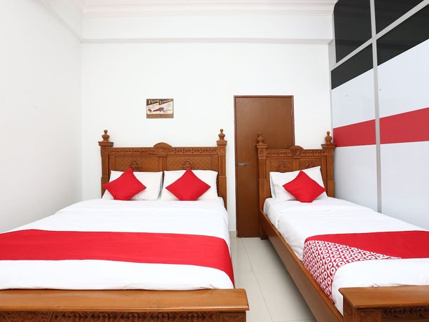 Imagen de la habitación del Hotel OYO 89435 Nusantara Group. Foto 13