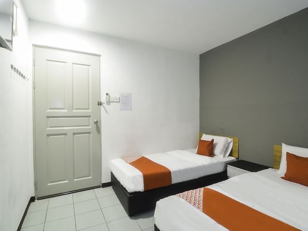 Imagen de la habitación del Hotel OYO 89465 Golden Lounge. Foto 3