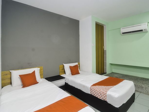 Imagen de la habitación del Hotel OYO 89465 Golden Lounge. Foto 6