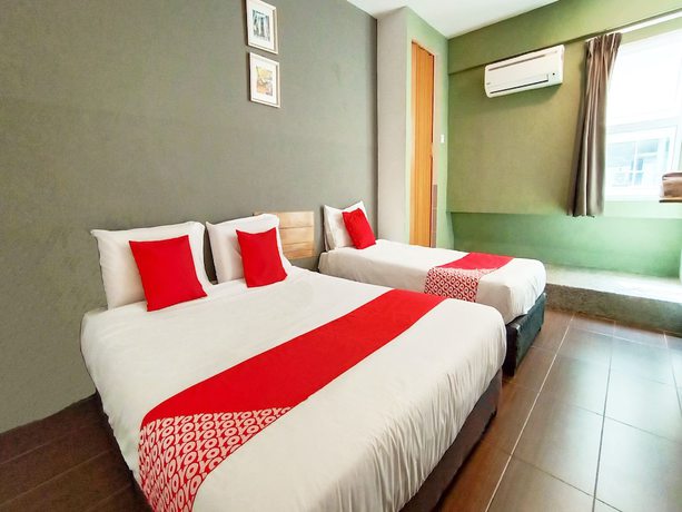 Imagen de la habitación del Hotel OYO 89465 Golden Lounge. Foto 9