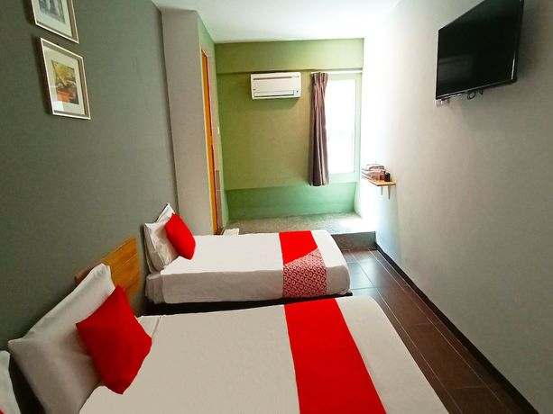 Imagen de la habitación del Hotel OYO 89465 Golden Lounge. Foto 11