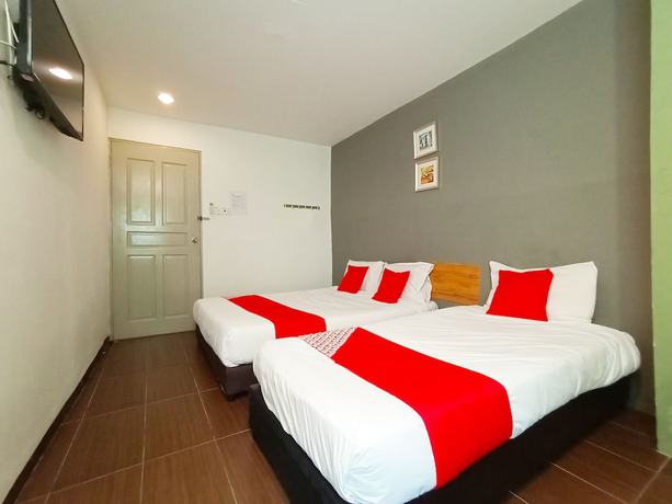 Imagen de la habitación del Hotel OYO 89465 Golden Lounge. Foto 16