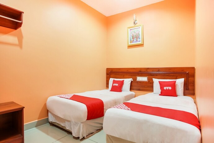 Imagen de la habitación del Hotel OYO 89470 My Town Hotel. Foto 2