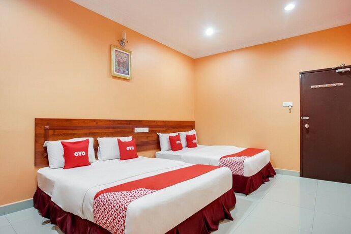 Imagen de la habitación del Hotel OYO 89470 My Town Hotel. Foto 3