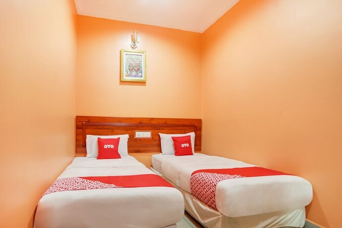 Imagen de la habitación del Hotel OYO 89470 My Town Hotel. Foto 4