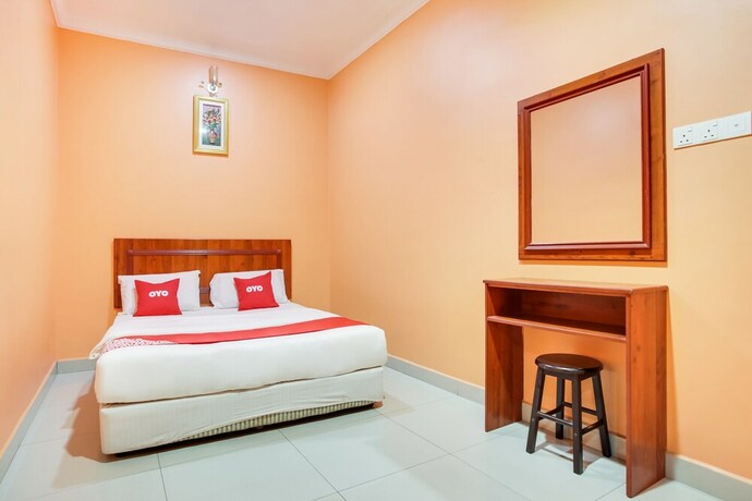 Imagen de la habitación del Hotel OYO 89470 My Town Hotel. Foto 5
