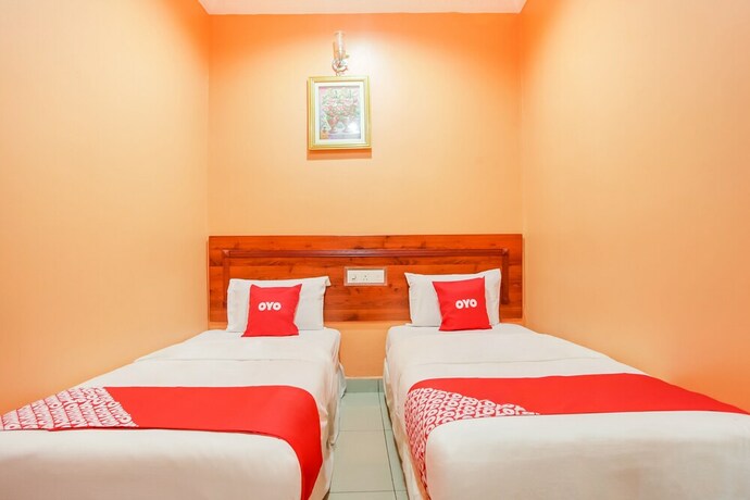 Imagen de la habitación del Hotel OYO 89470 My Town Hotel. Foto 6