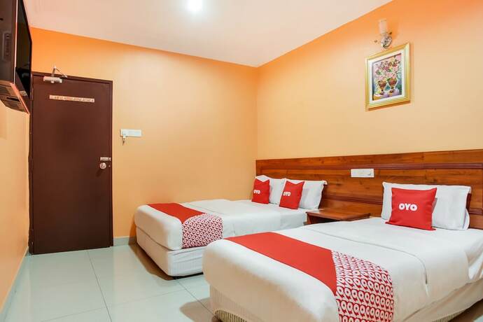 Imagen de la habitación del Hotel OYO 89470 My Town Hotel. Foto 8
