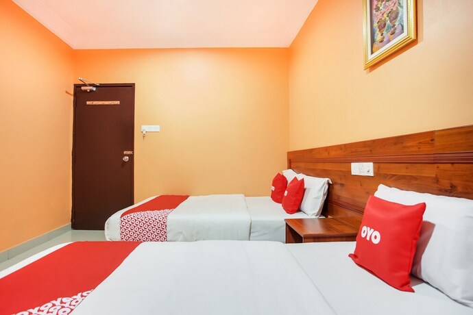 Imagen de la habitación del Hotel OYO 89470 My Town Hotel. Foto 9