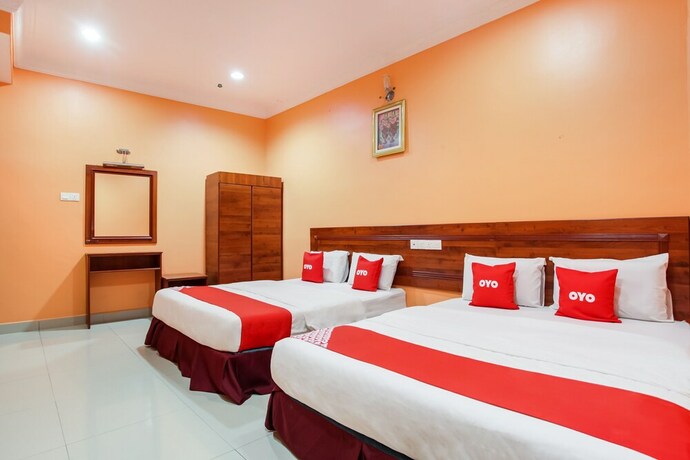 Imagen de la habitación del Hotel OYO 89470 My Town Hotel. Foto 10
