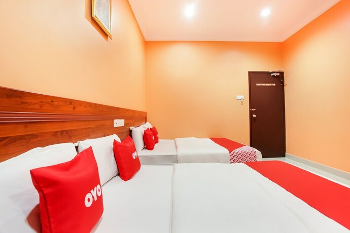 Imagen de la habitación del Hotel OYO 89470 My Town Hotel. Foto 11