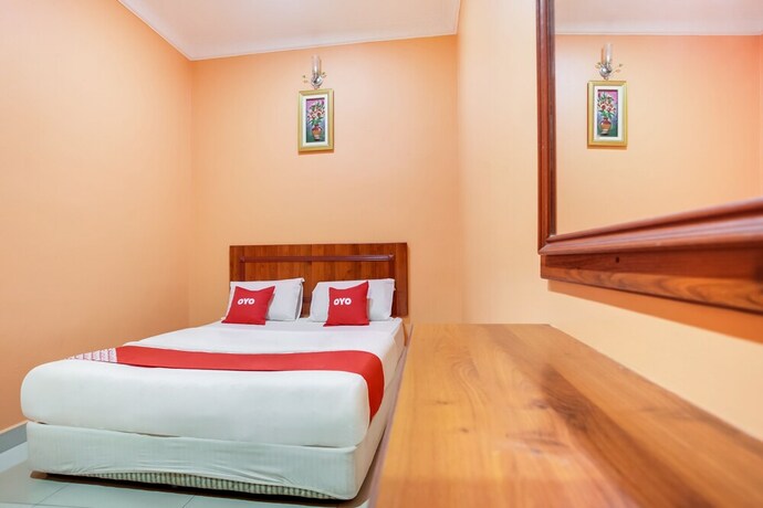 Imagen de la habitación del Hotel OYO 89470 My Town Hotel. Foto 14