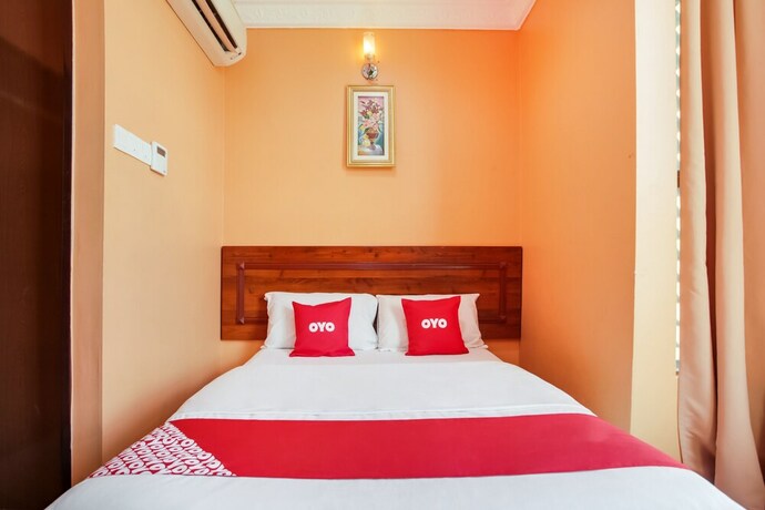 Imagen de la habitación del Hotel OYO 89470 My Town Hotel. Foto 15