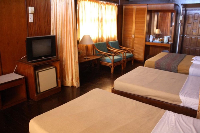 Imagen de la habitación del Hotel OYO 89488 Pcb Resort. Foto 1