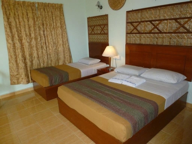 Imagen de la habitación del Hotel OYO 89488 Pcb Resort. Foto 6