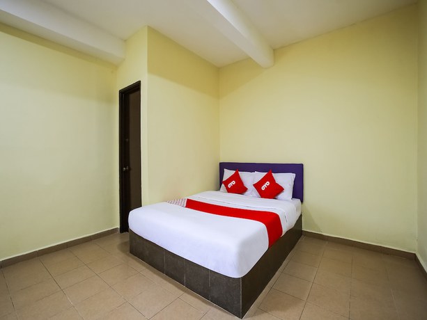 Imagen de la habitación del Hotel OYO 89585 Happy Inn. Foto 6