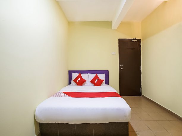 Imagen de la habitación del Hotel OYO 89585 Happy Inn. Foto 7