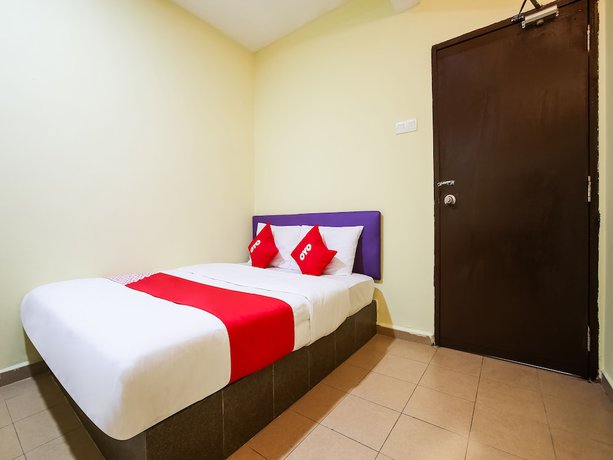 Imagen de la habitación del Hotel OYO 89585 Happy Inn. Foto 11