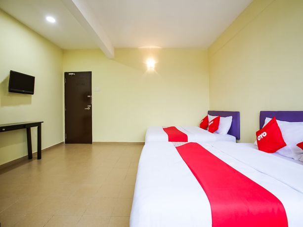 Imagen de la habitación del Hotel OYO 89585 Happy Inn. Foto 12