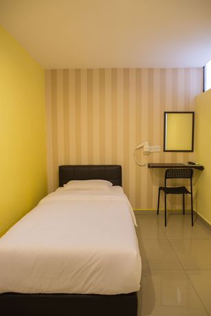 Imagen de la habitación del Hotel OYO 89597 Parc Hotel. Foto 11
