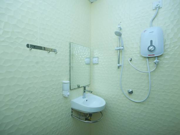 Imagen de la habitación del Hotel OYO 896 Bintang Fajar. Foto 5