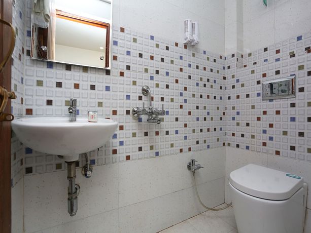 Imagen de la habitación del Hotel OYO 8961 RR Palace. Foto 14