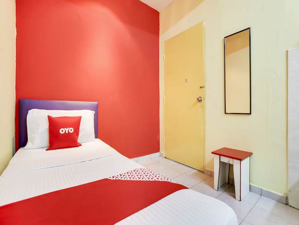 Imagen de la habitación del Hotel OYO 89615 T Family. Foto 5