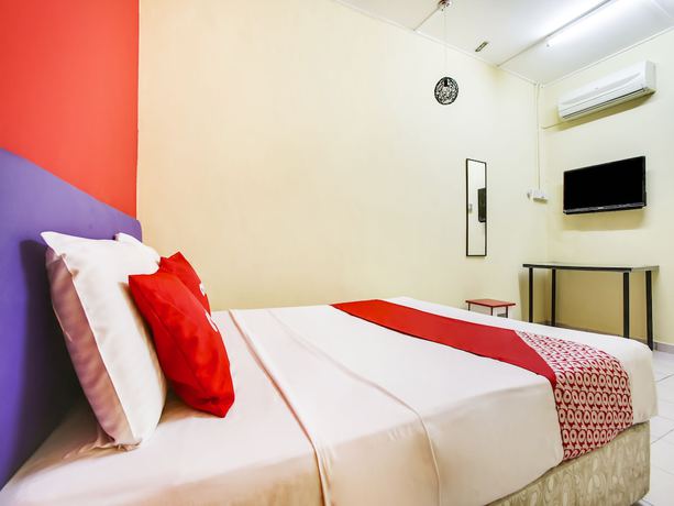 Imagen de la habitación del Hotel OYO 89615 T Family. Foto 10