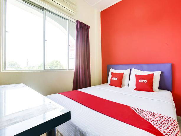 Imagen de la habitación del Hotel OYO 89615 T Family. Foto 11