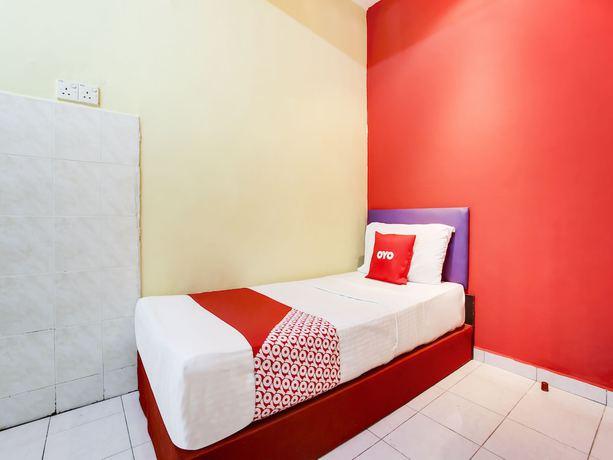 Imagen de la habitación del Hotel OYO 89615 T Family. Foto 13