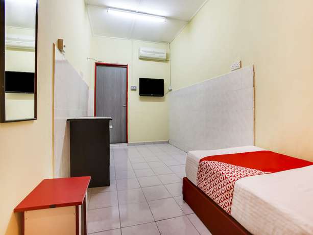 Imagen de la habitación del Hotel OYO 89615 T Family. Foto 14