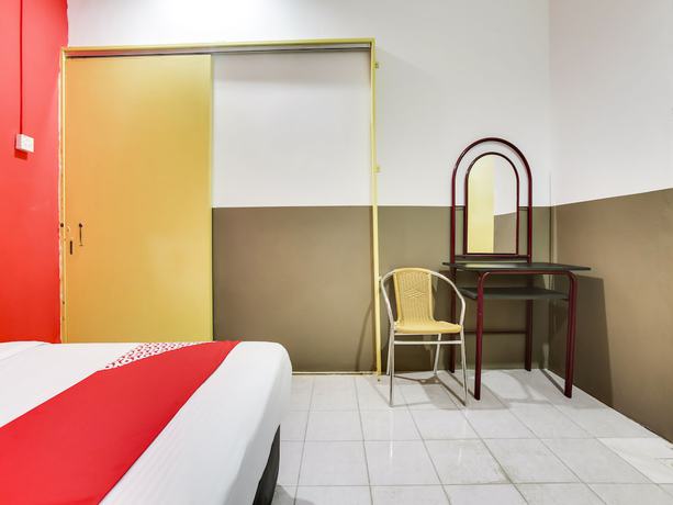 Imagen de la habitación del Hotel OYO 89615 T Family. Foto 15