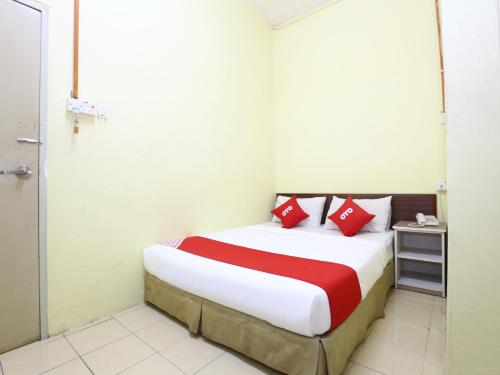 Imagen de la habitación del Hotel OYO 89651 Harmoni, Kota Bharu. Foto 4